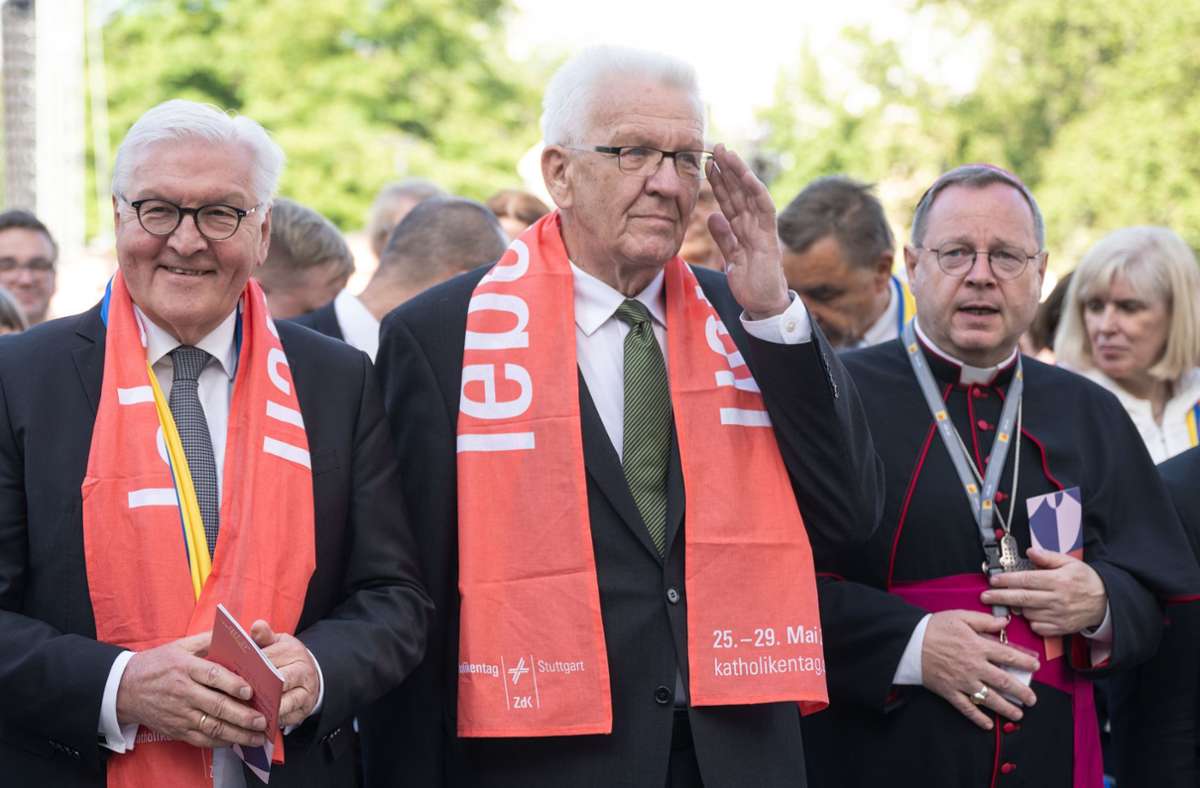 Winfried Kretschmann (Mitte) beim Katholikentag in Stuttgart. Foto: dpa/Marijan Murat