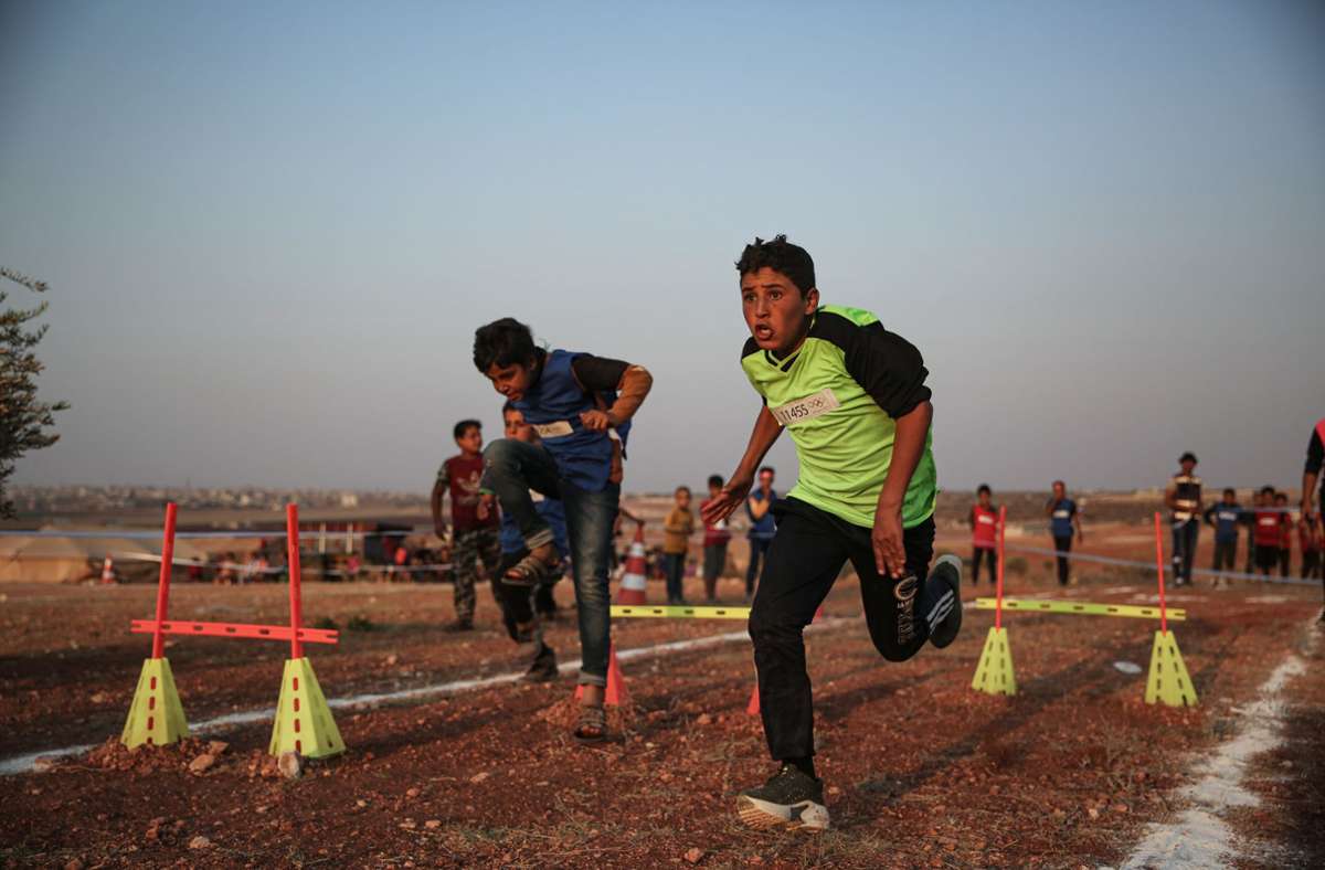 Olympia der Zelte: Syrische Flüchtlingskinder veranstalten Olympische Spiele
