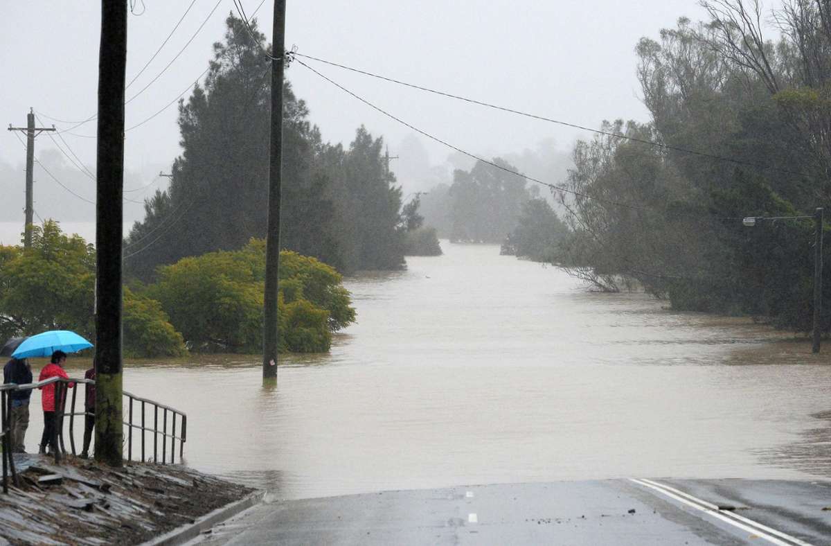 Überschwemmungen bei Sydney. Foto: AFP/MUHAMMAD FAROOQ