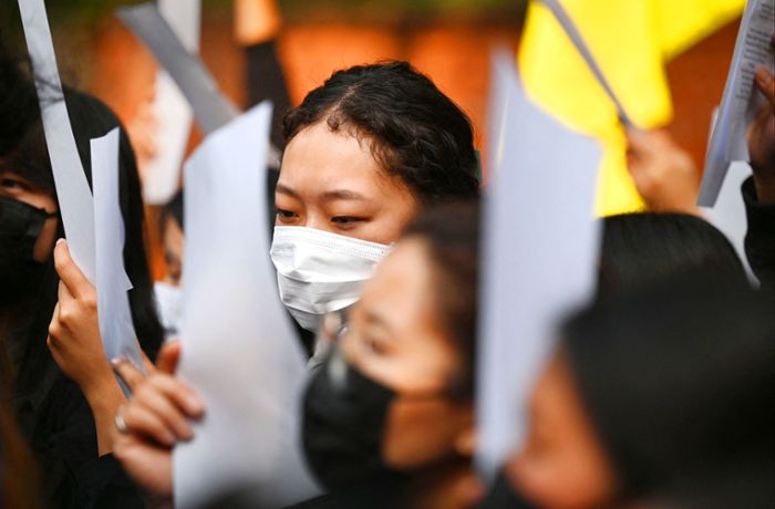 Demonstrationen in China: Vor den Augen des Staates schützen keine  Masken